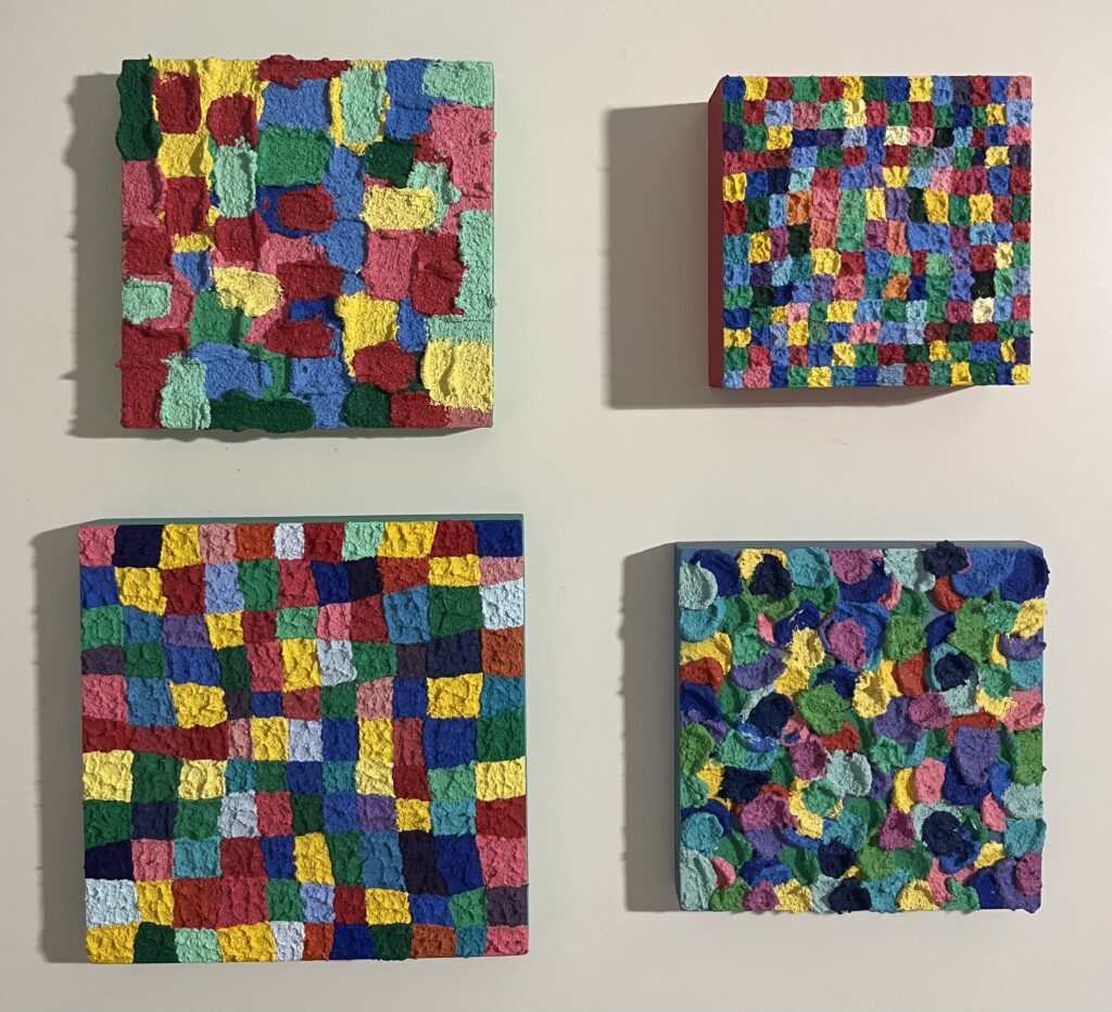 four small colorful paintings with squares and splotches